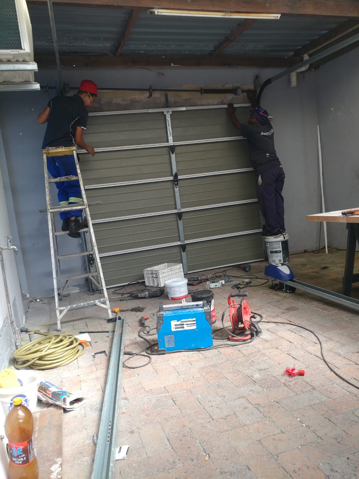 Maintenance tools and equipment for garage door servicing